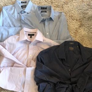4 men’s dress shirts - sold as lot.